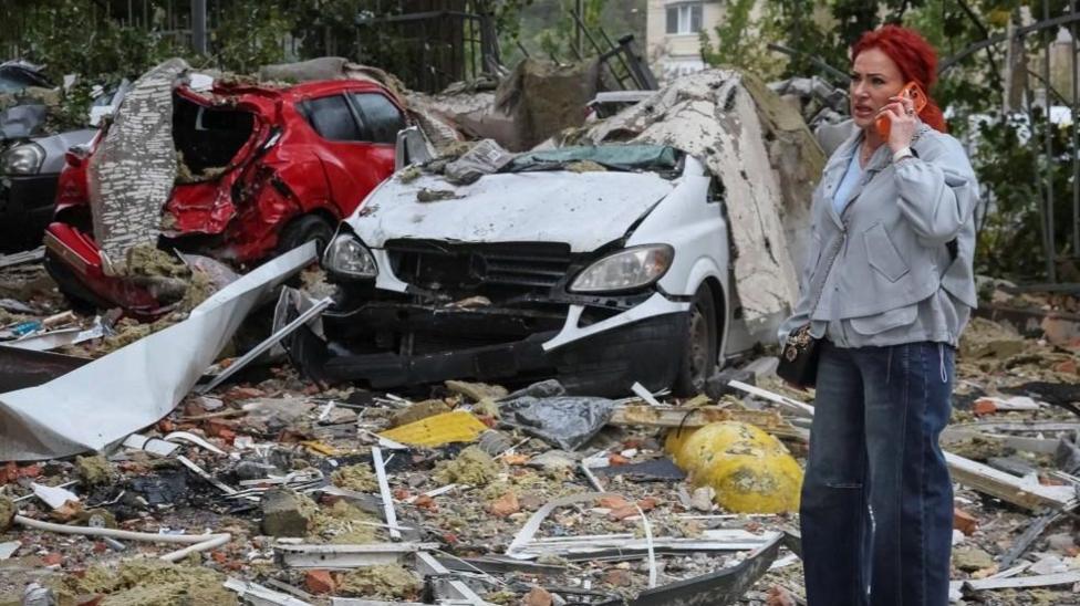 Kyiv missile attack aftermath — wrecked cars and debris in the Ukrainian capital