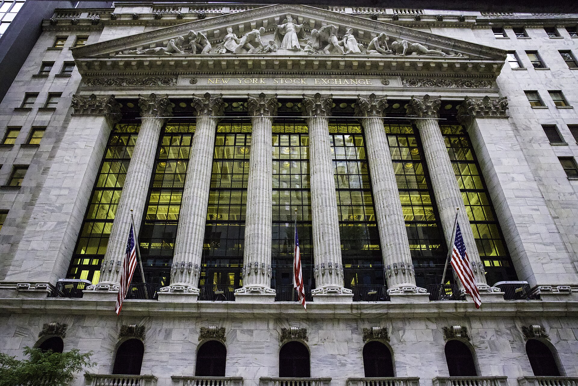 The New York Stock Exchange facade on Broad Street with the trading floor lit from within (file photo)