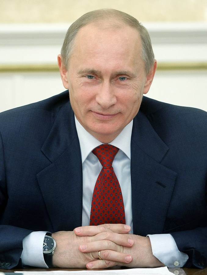 Russian President Vladimir Putin in a file photograph, as he told reporters at St. Petersburg's United Cultures Forum that all Ukraine peace proposals remain on the table