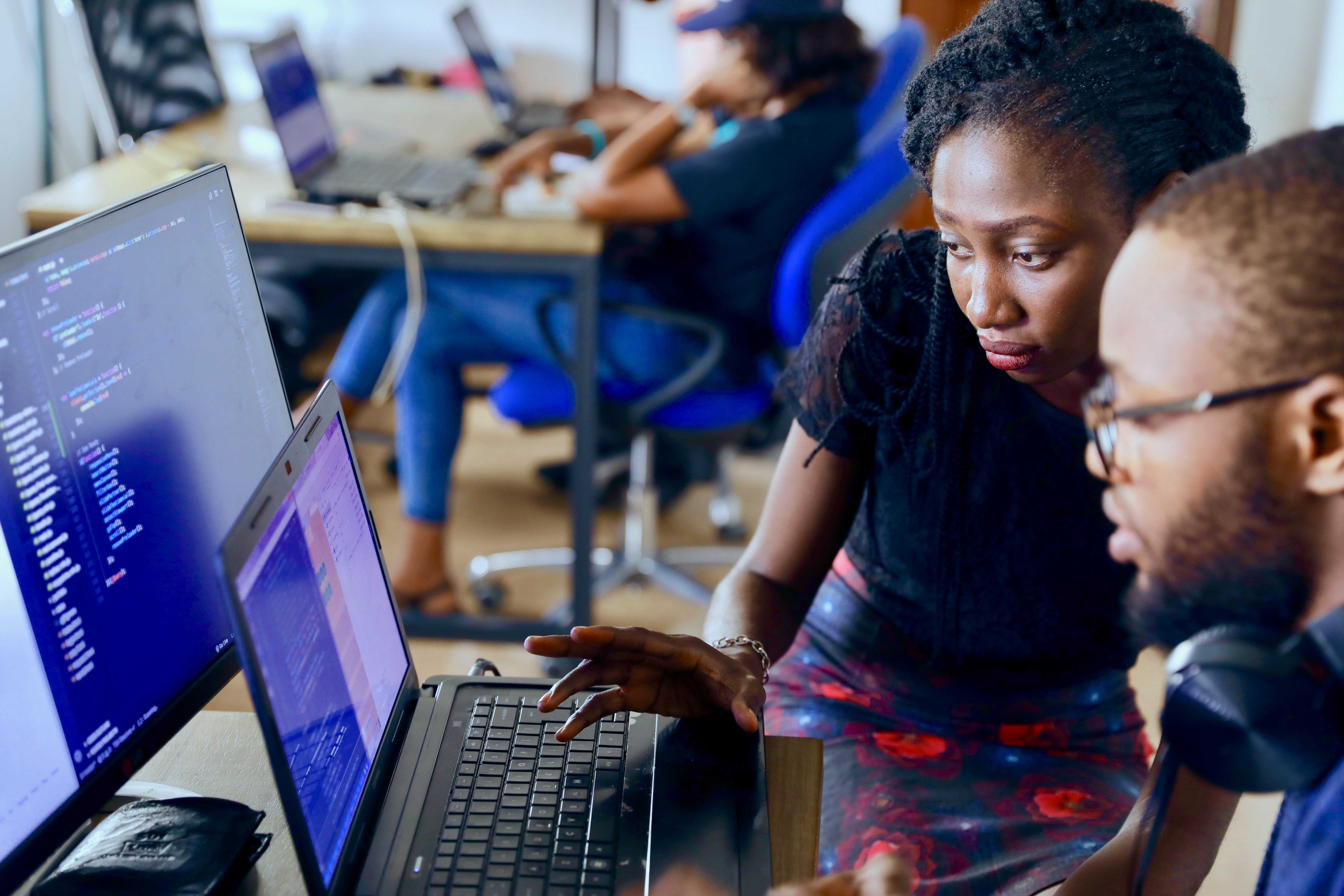 Software developers working at their desks