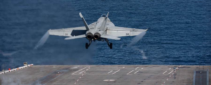 An F/A-18E Super Hornet launching from the flight deck of USS Nimitz in 2022 — the Super Hornet fleet the Boeing F/A-XX sixth-generation fighter will begin replacing in the 2030s