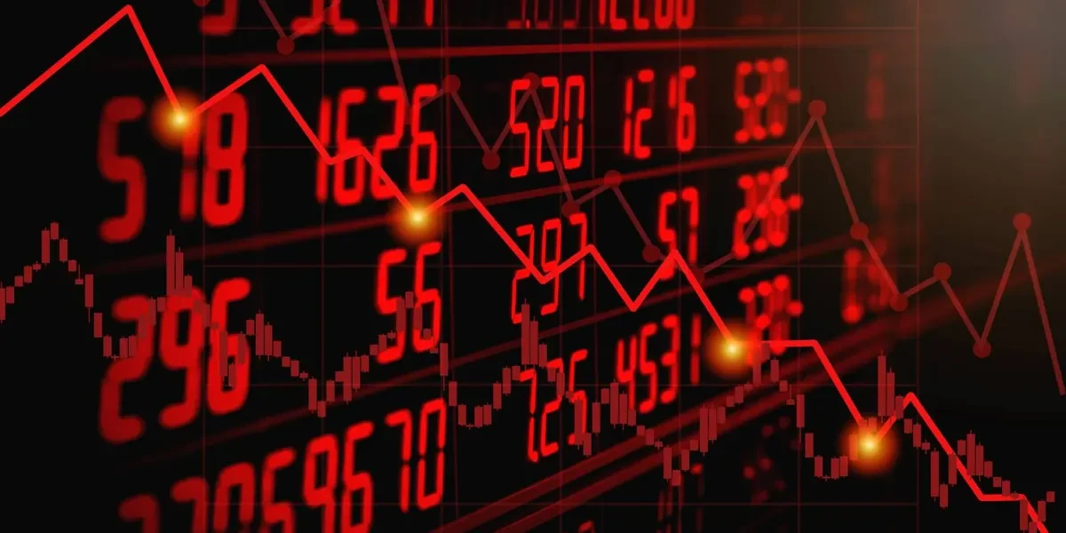 A stock market screen flashing red as prices fall — French bank shares led the CAC 40 lower on Monday as France bond yields jumped