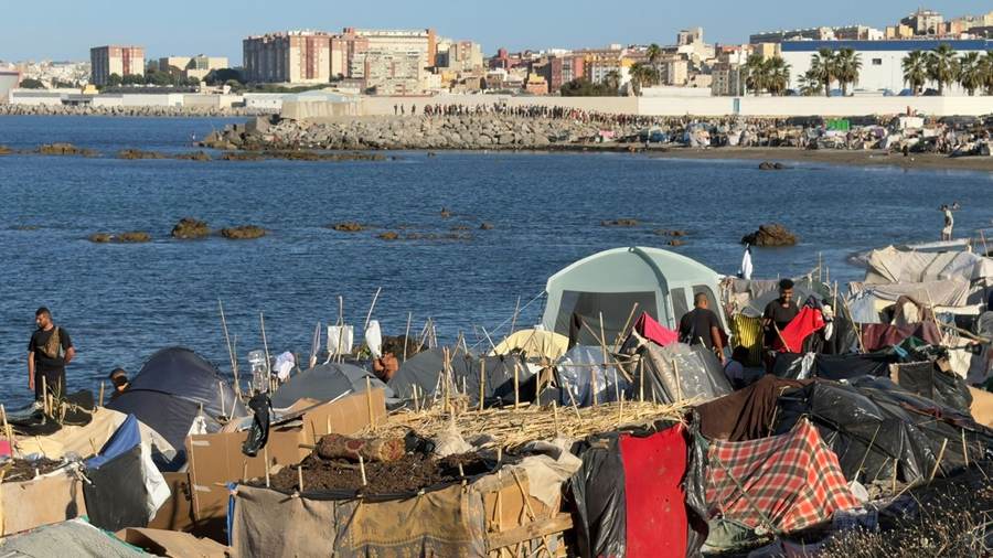 Makeshift shelters and people at the Ceuta camp during the Morocco Spain border migrants crisis