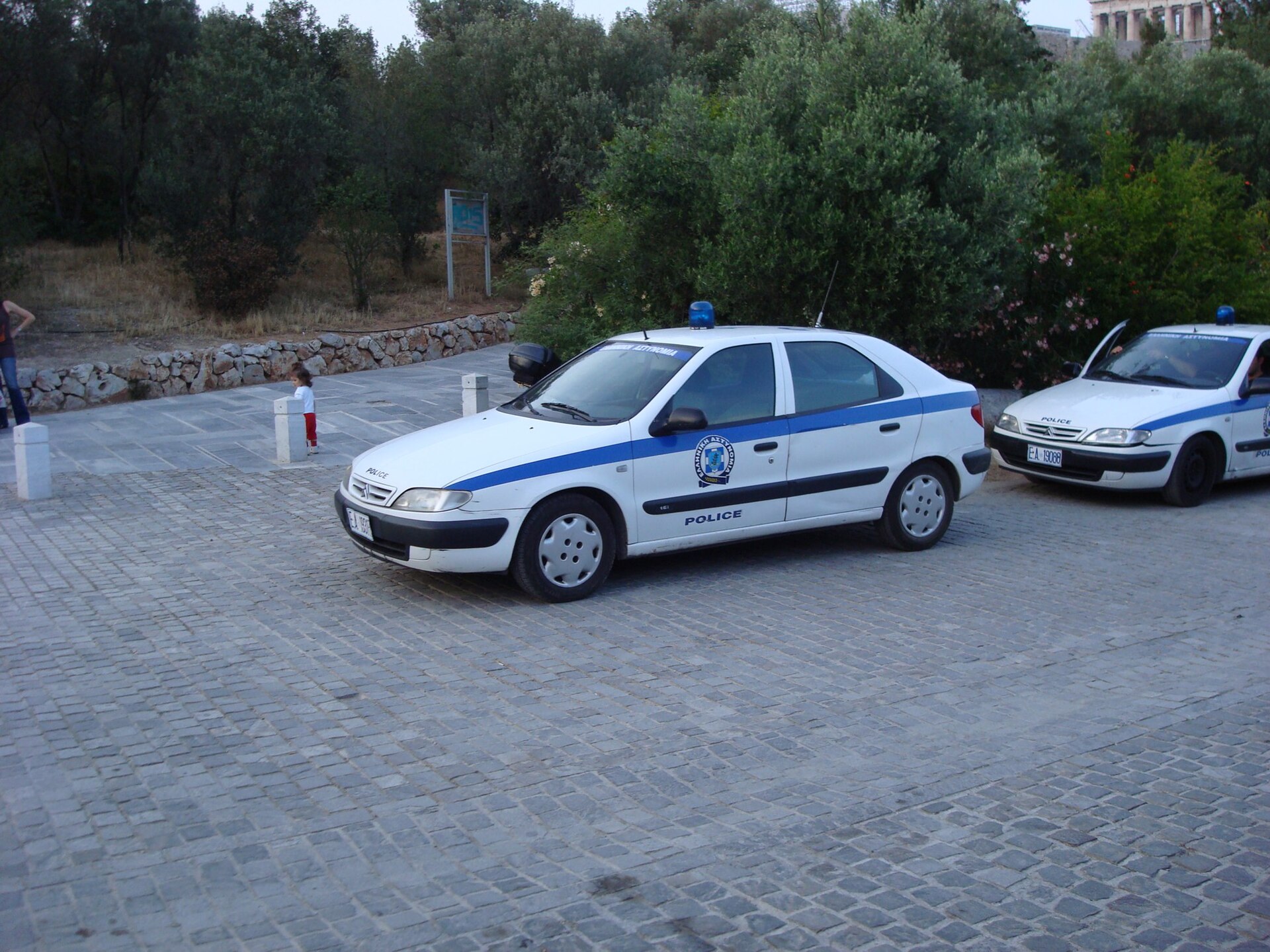 Hellenic Police patrol cars in Athens — Greek police said the Kolonos explosion is not being treated as terrorism and the homicide unit is investigating