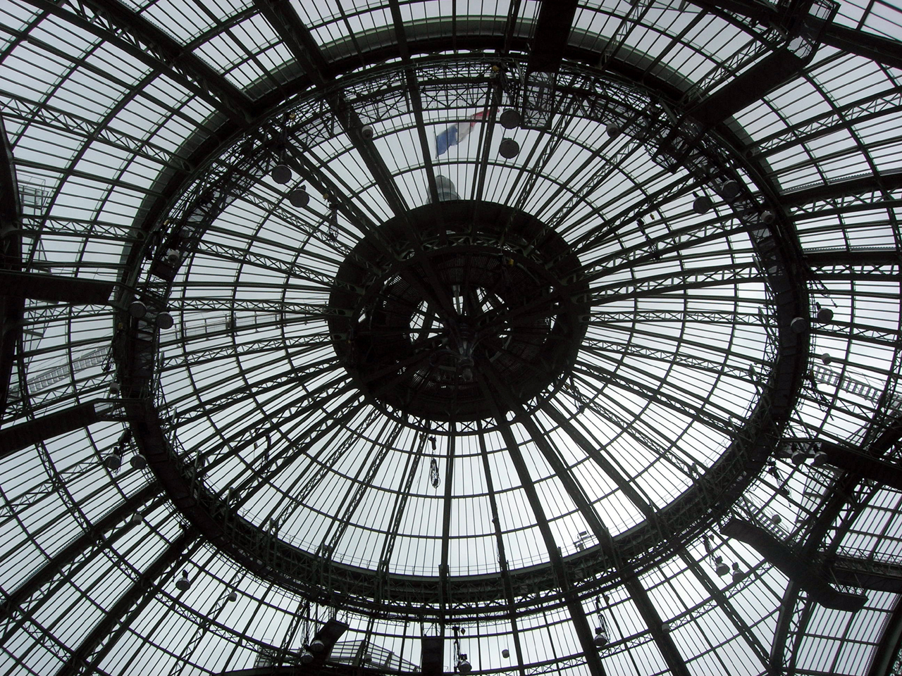 Looking up at the glass dome of the Grand Palais, where 211 galleries from 41 countries exhibited at Art Basel Paris 2026