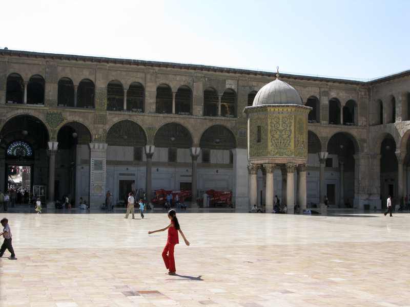 The Umayyad Mosque courtyard in Damascus, Syria — where the new government is demanding Bassam al-Hassan's return