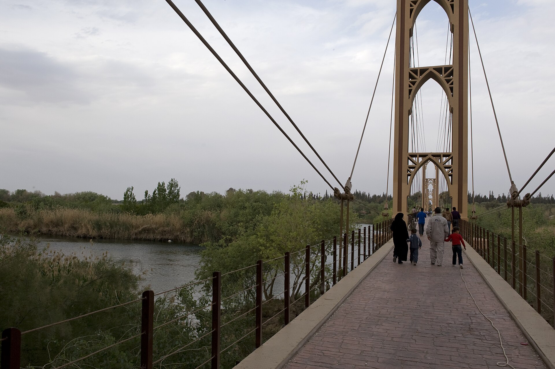 The Deir ez-Zor suspension bridge over the Euphrates River in eastern Syria in a file photo, in the governorate where Deir Az Zor flooding cut roads and communications