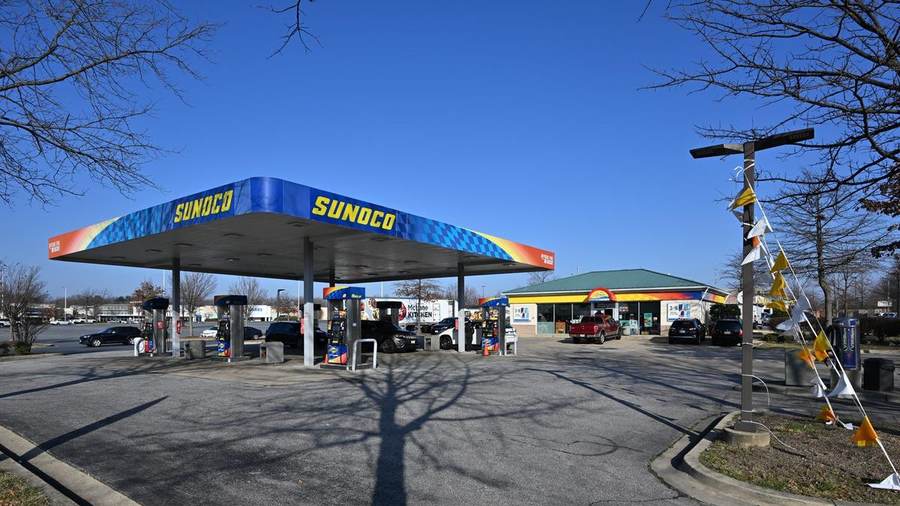 A Sunoco gas station in Calverton, Maryland — fuel economy standards decide how far American cars must travel on a gallon of gasoline