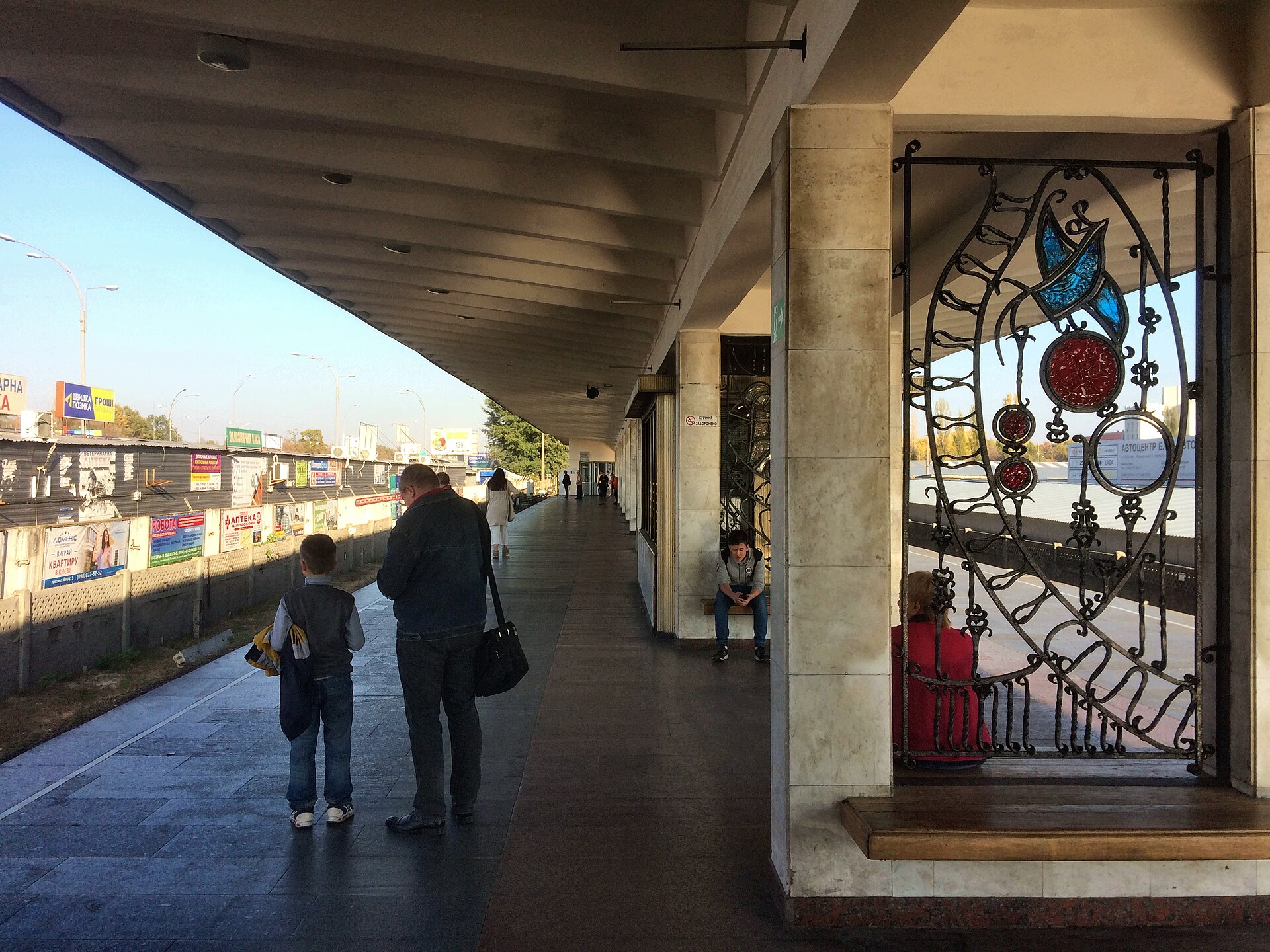 Passengers on the open-air platform of Lisova metro station in Kyiv Desnyanskyi district, the station reported damaged in the Russian missile strike Kyiv