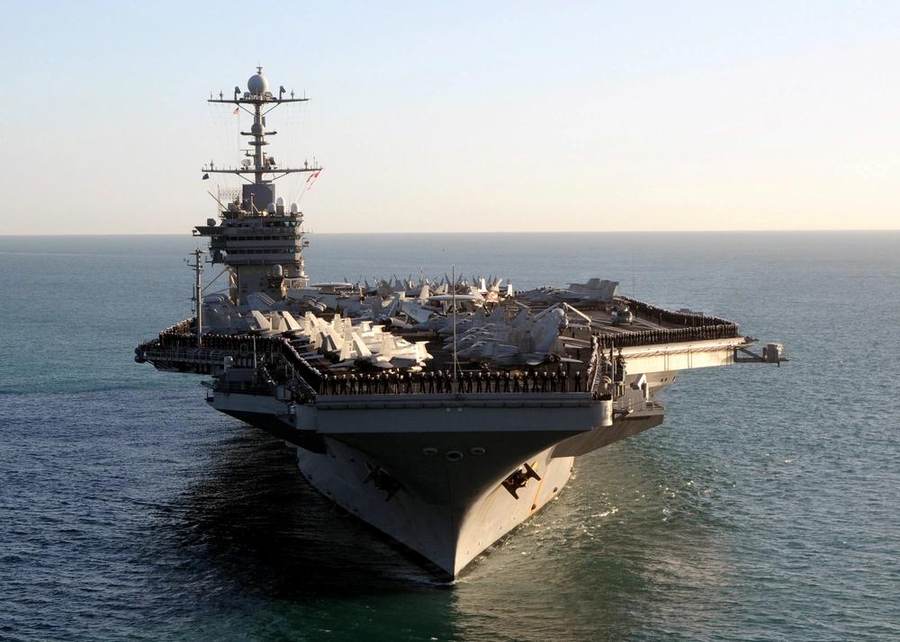 U.S. Navy aircraft carrier under way as American forces support Middle East deterrence