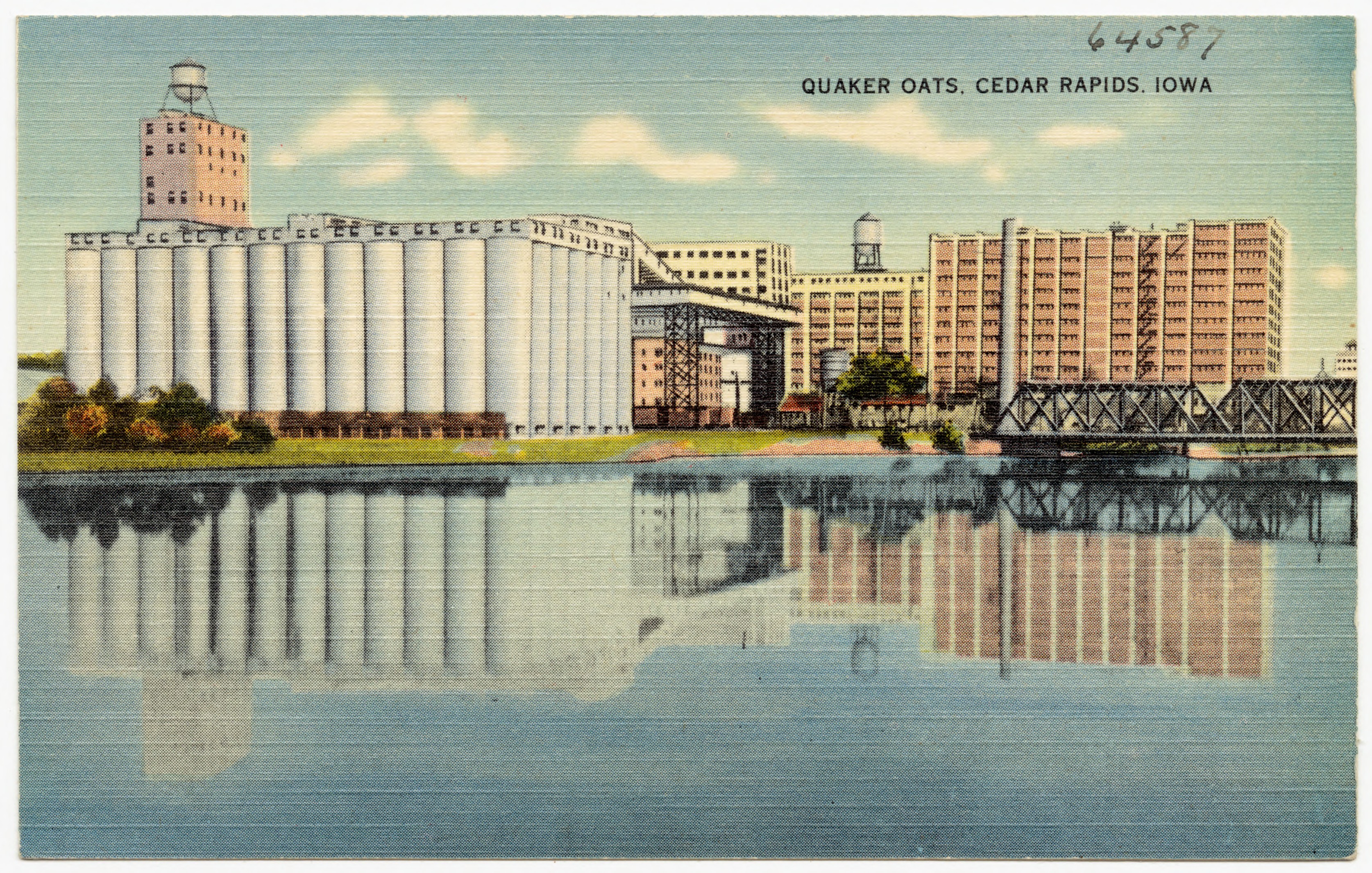 Historic postcard view of the Quaker Oats plant in Cedar Rapids, Iowa, across the Cedar River