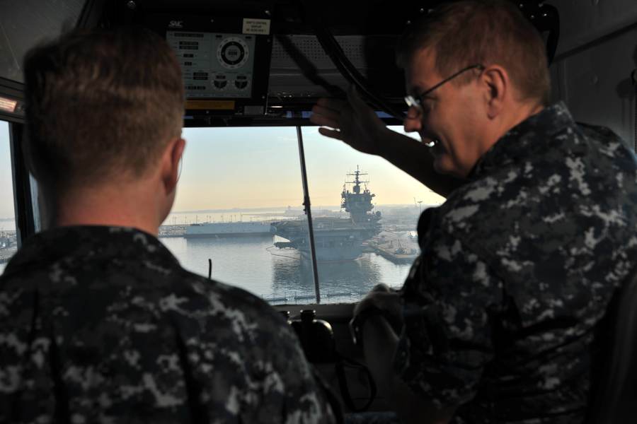 USS George H.W. Bush passes USS Enterprise near Norfolk in December 2012