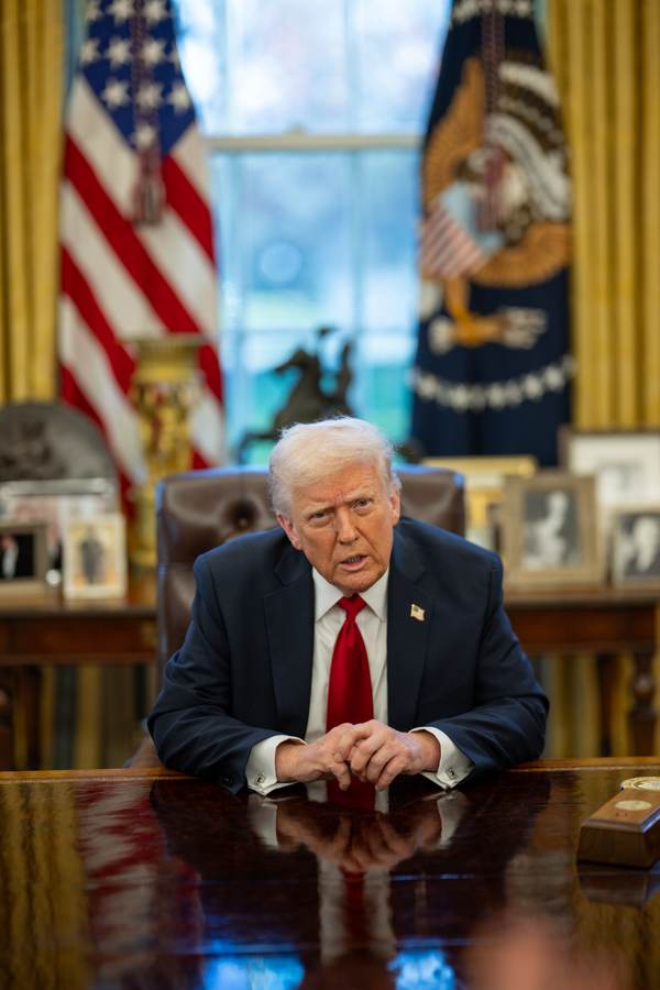 President Donald Trump discusses policy in the Oval Office before the Trump super intelligence AI rebrand
