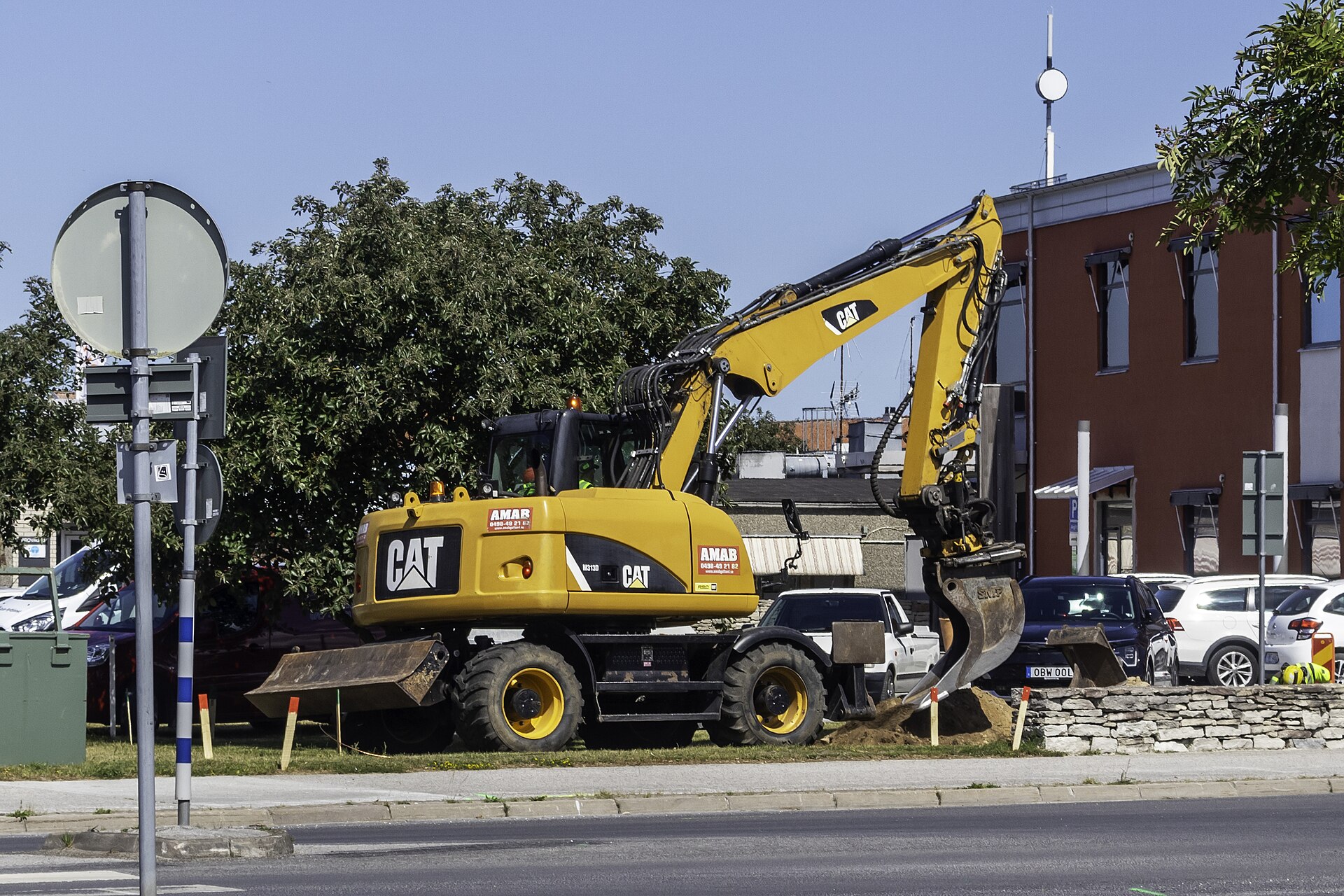 A Caterpillar M313D wheeled excavator at work in Visby, Sweden (file photo) — Caterpillar shares fell more than 9 percent at the October 29, 2026 market close