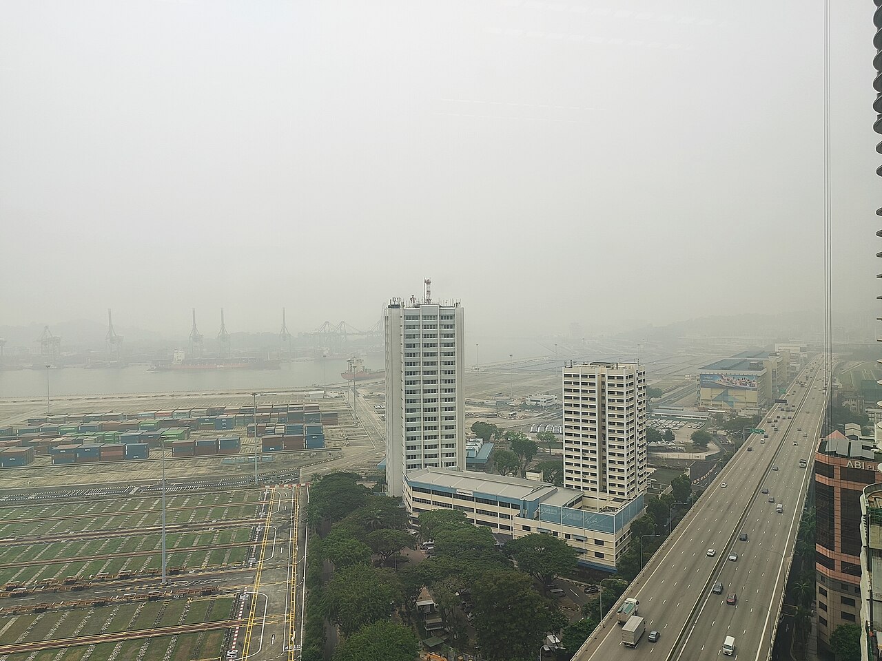 The Port of Singapore's Tanjong Pagar container terminal shrouded in haze on October 14, 2026